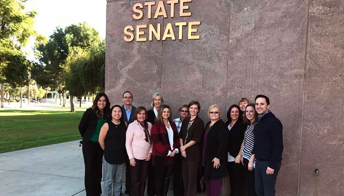 Triadvocates Team in front of the state senate building.